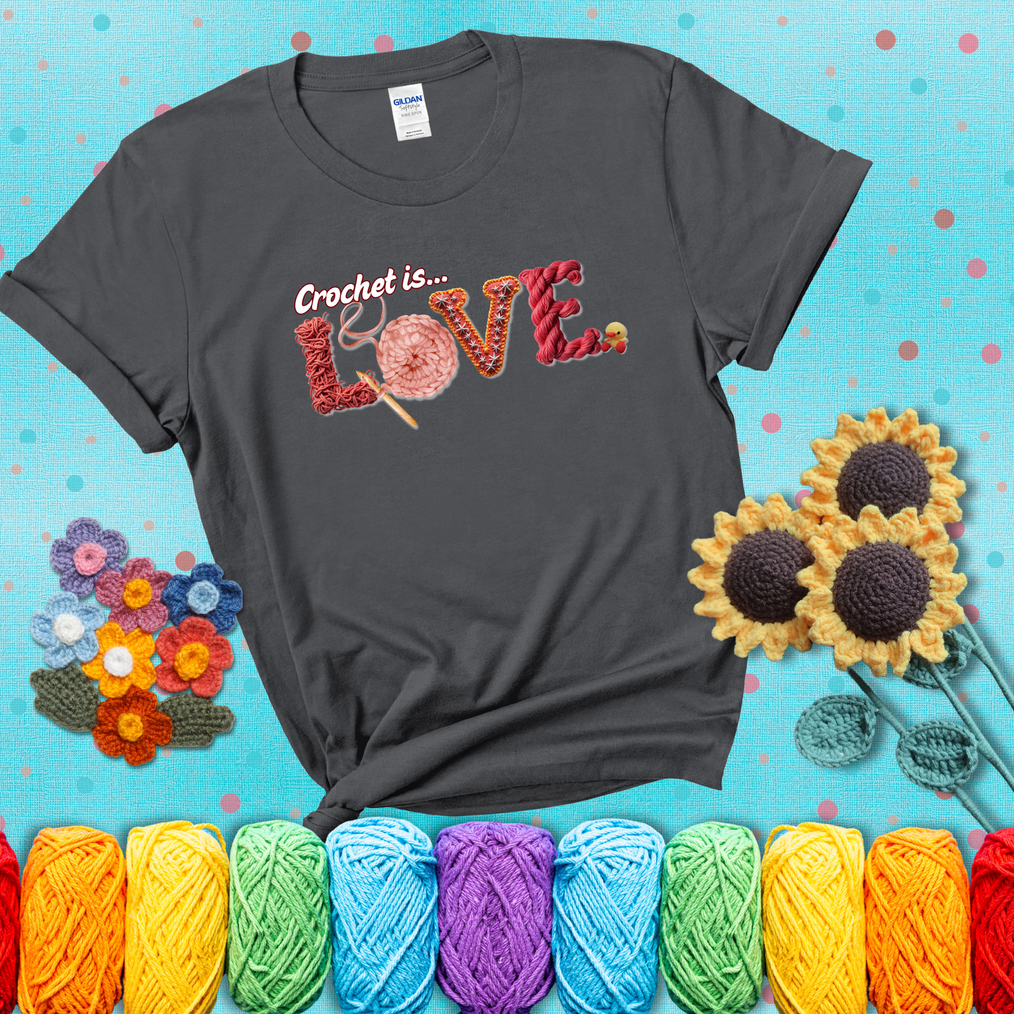 The word "LOVE" spelled with different crochet textures and yarn in red tones, with the phrase “Crochet is…” above in script. showing a pink tee with a teal sunflower background