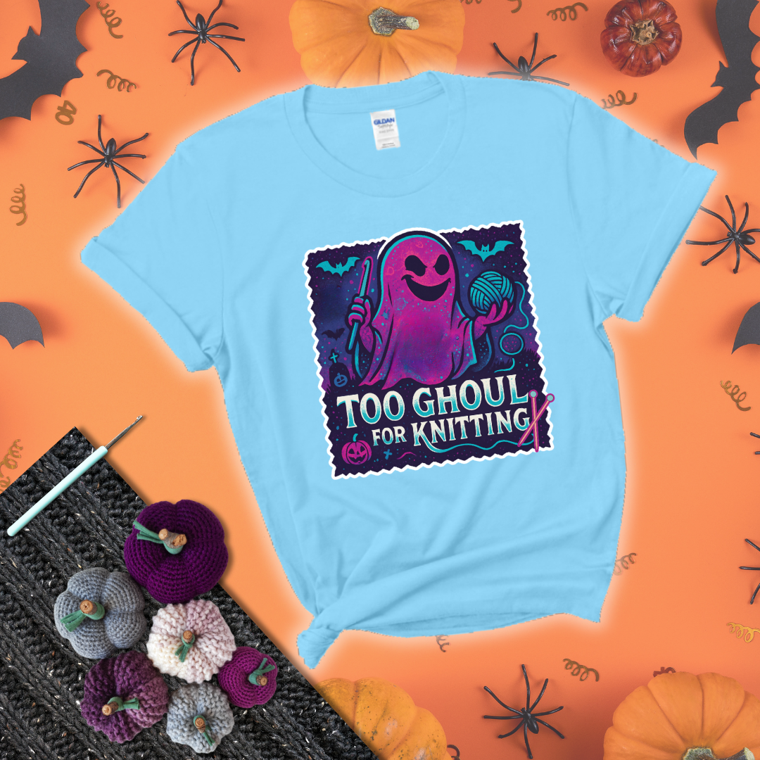 A spooky ghost holds a yarn ball and crochet hook in a vibrant Halloween palette with bats, tombstones, and pumpkins wearing a light blue tee with a festive halloween background