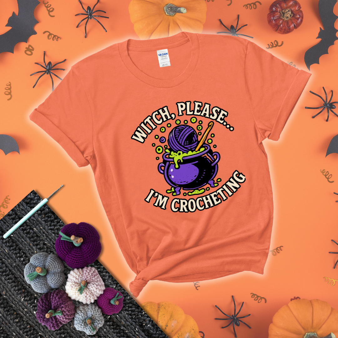 Put a spell on your stash Design reads 'Witch, Please… I’m Crocheting,' perfect crochet gift for yarn lovers showing a light orange tee with a festive Halloween background