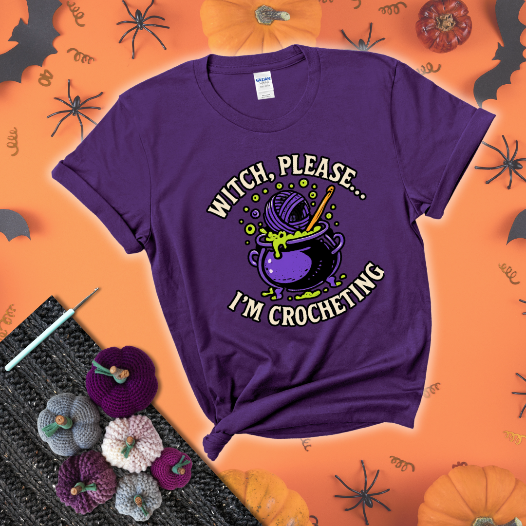 Put a spell on your stash Design reads 'Witch, Please… I’m Crocheting,' perfect crochet gift for yarn lovers showing a purple tee with a festive Halloween background