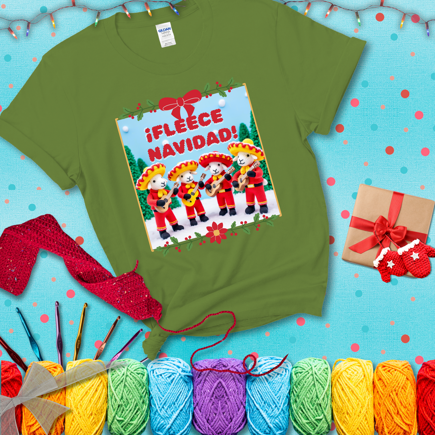 Four crocheted sheep dressed in red mariachi outfits with guitars, standing in a snowy scene under the phrase “¡Fleece Navidad!” showing a bright green tee with a festive Christmas background