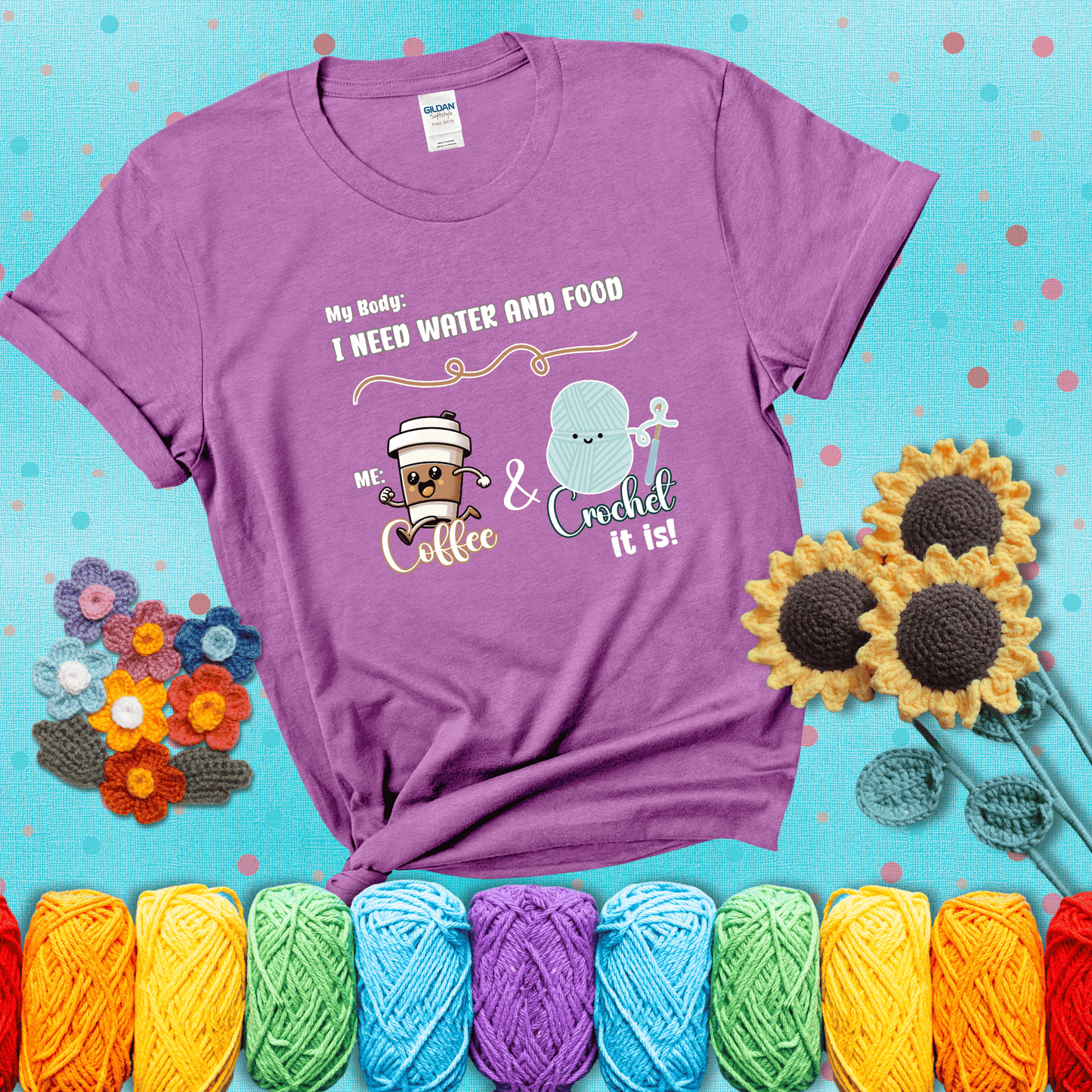 Design reads “My body: I need water and food. Me: Coffee & Crochet it is,” with a smiling coffee cup and yarn ball characters showing a light purple tee with a teal sunflower background