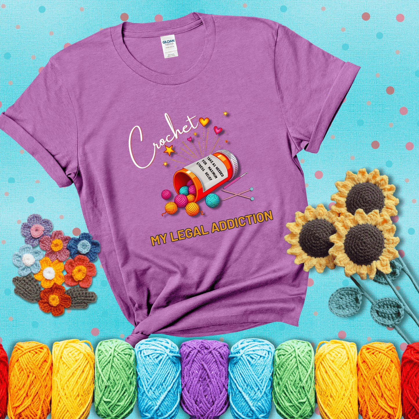 Orange prescription bottle spilling colorful yarn balls with text "Crochet – My Legal Addiction" and "Take as needed for maximum stress relief" showing a light purple tee with a teal sunflower background