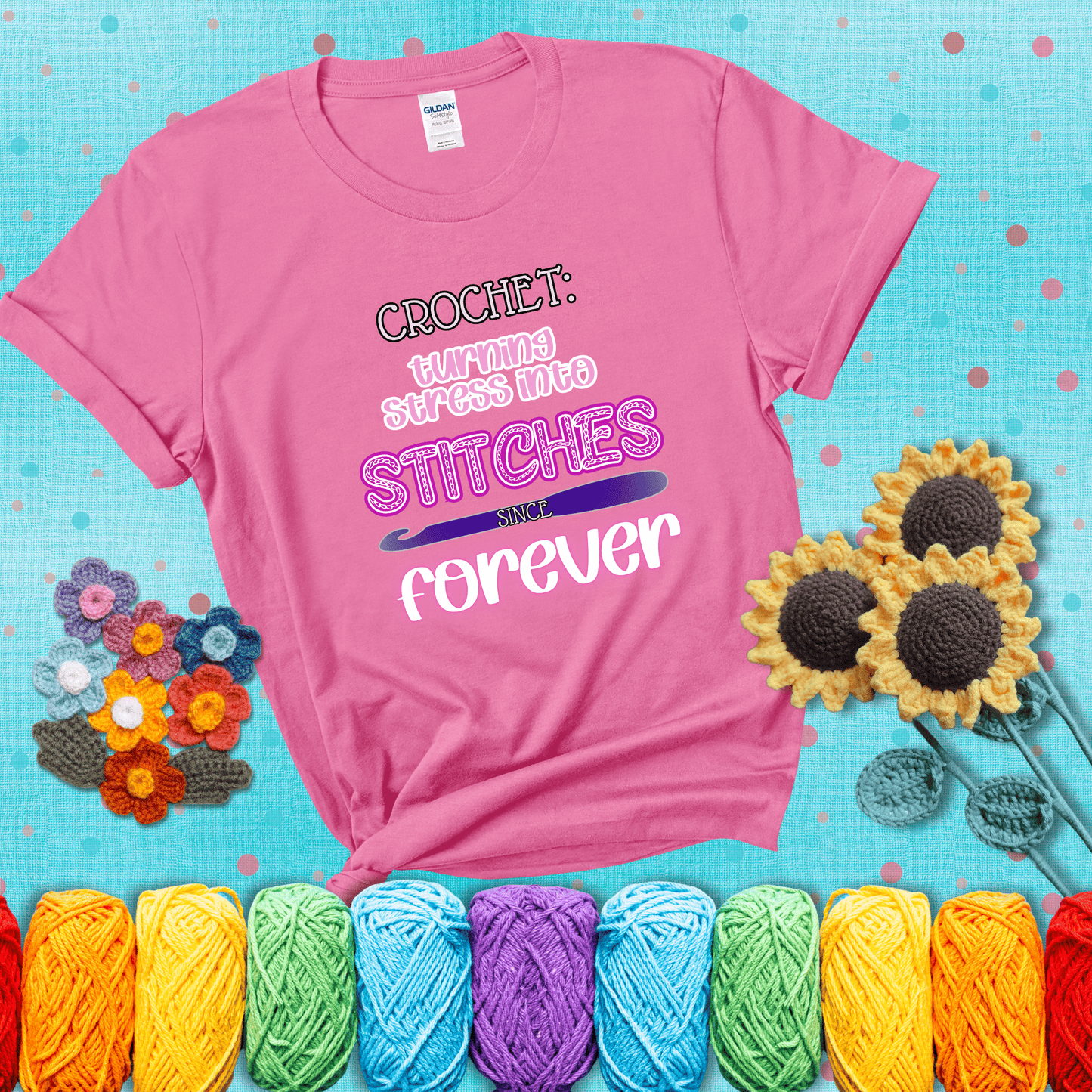 When life gets tangled, we stitch it out Design reads 'Crochet: Turning Stress Into Stitches Since Forever' , perfect crochet gift for yarn lovers; showing a pink tee with a teal sunflower background