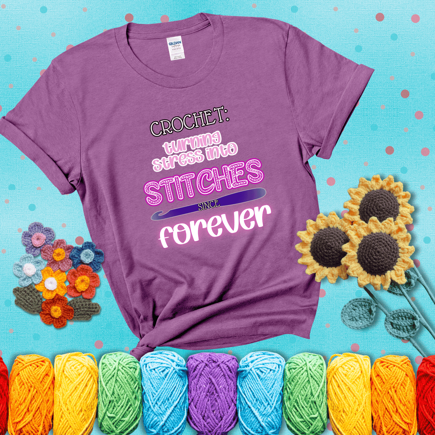 When life gets tangled, we stitch it out Design reads 'Crochet: Turning Stress Into Stitches Since Forever' , perfect crochet gift for yarn lovers; showing a light purple tee with a teal sunflower background