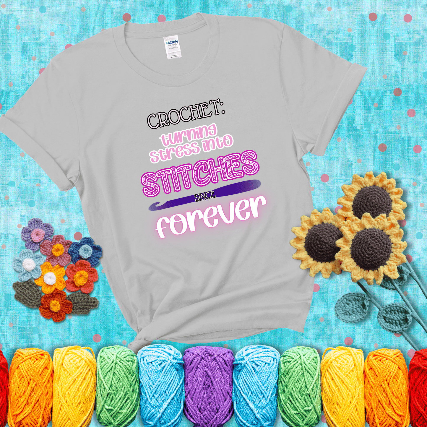 When life gets tangled, we stitch it out Design reads 'Crochet: Turning Stress Into Stitches Since Forever' , perfect crochet gift for yarn lovers; showing a light grey tee with a teal sunflower background