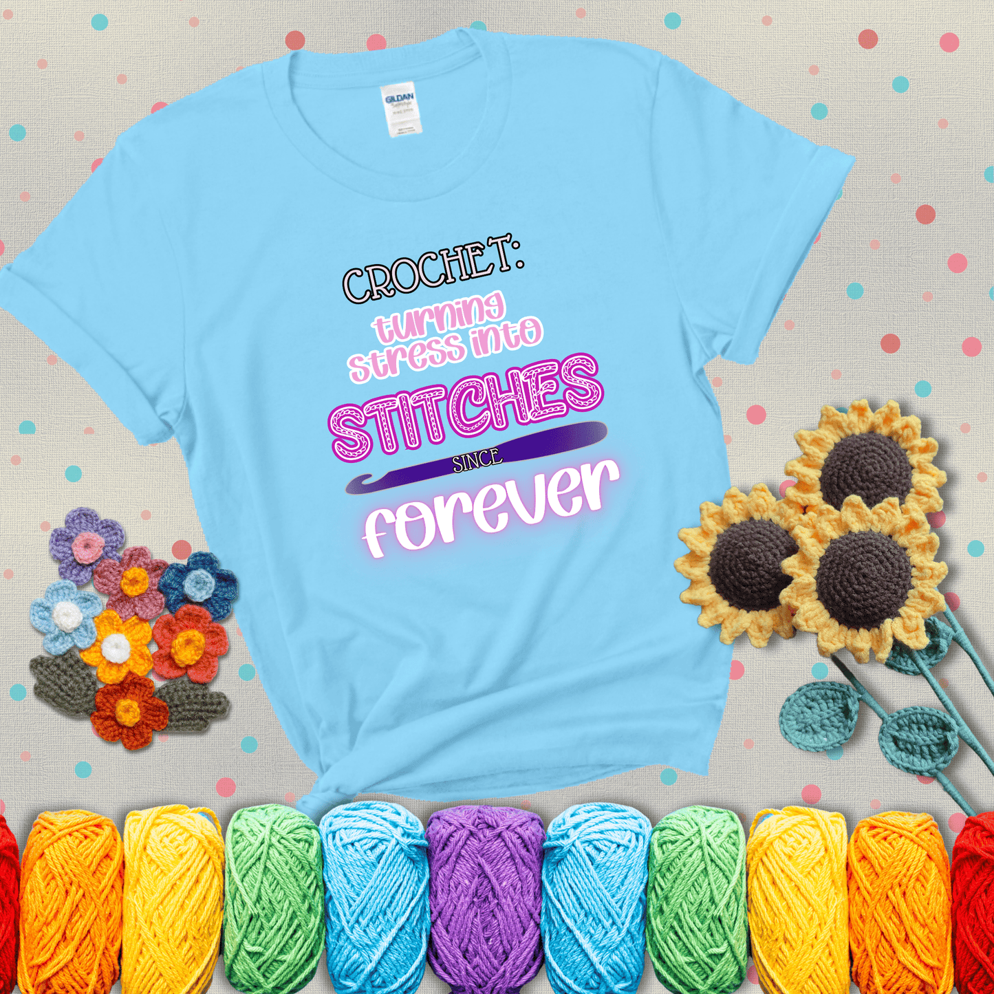 When life gets tangled, we stitch it out Design reads 'Crochet: Turning Stress Into Stitches Since Forever' , perfect crochet gift for yarn lovers; showing a light blue tee with grey sunflower background