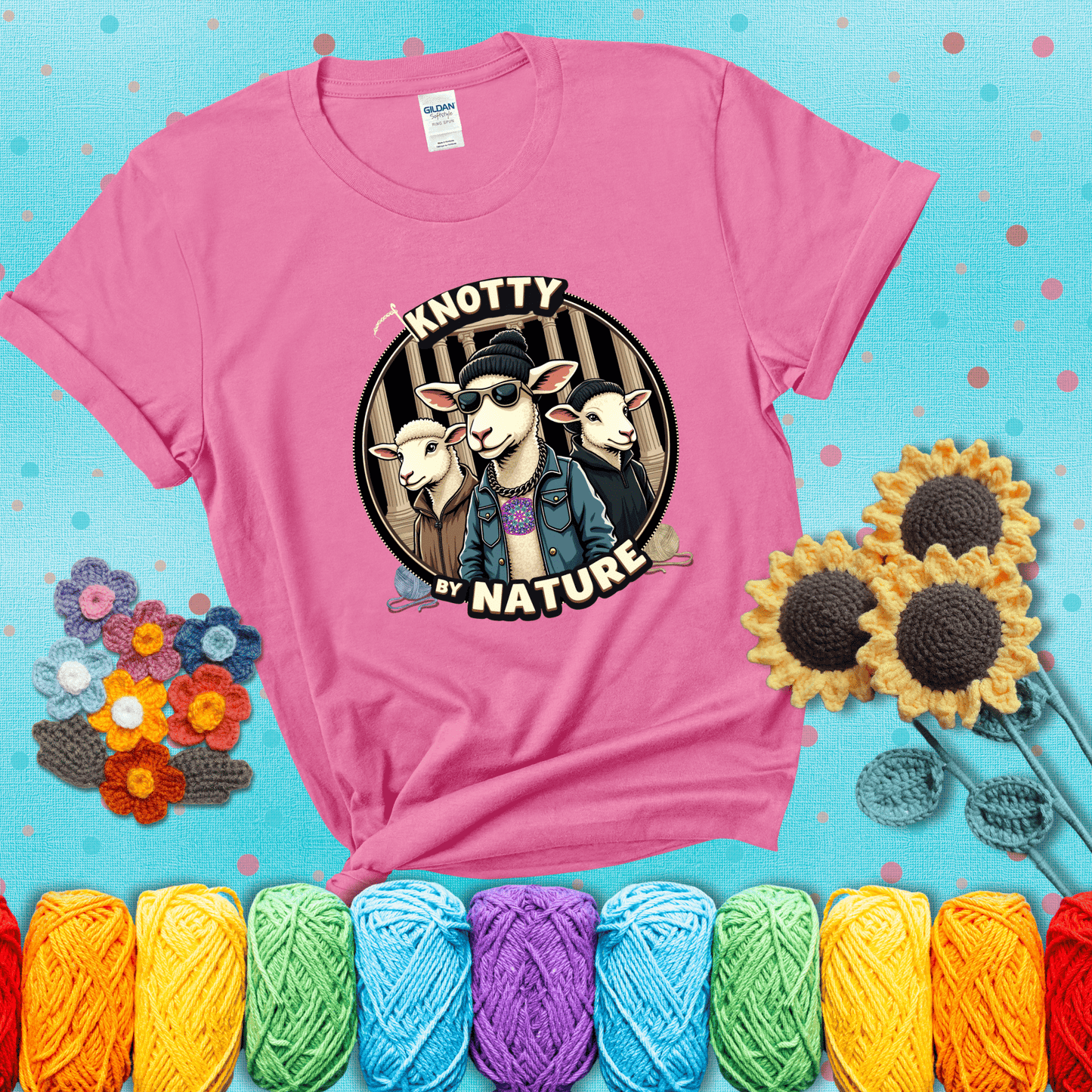 Three cool sheep dressed in urban streetwear pose in front of columns, with bold text “Knotty By Nature,” a hilarious crochet parody with swagger showing a pink tee with a teal sunflower background