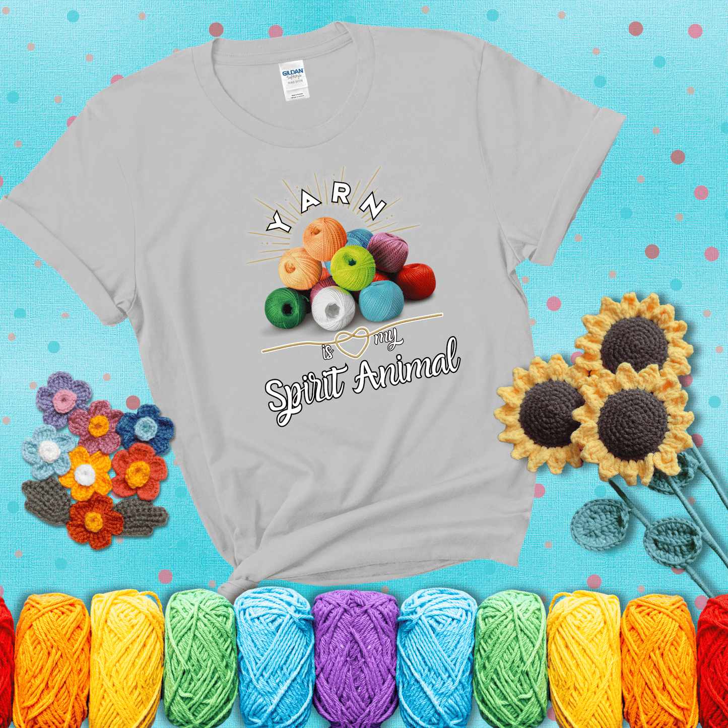 Stack of colorful yarn balls with radiant glow. Text reads: “Yarn Is My Spirit Animal.” A calming and colorful tee for fiber lovers who find zen in stitching, showing a light grey tee with a teal sunflower background