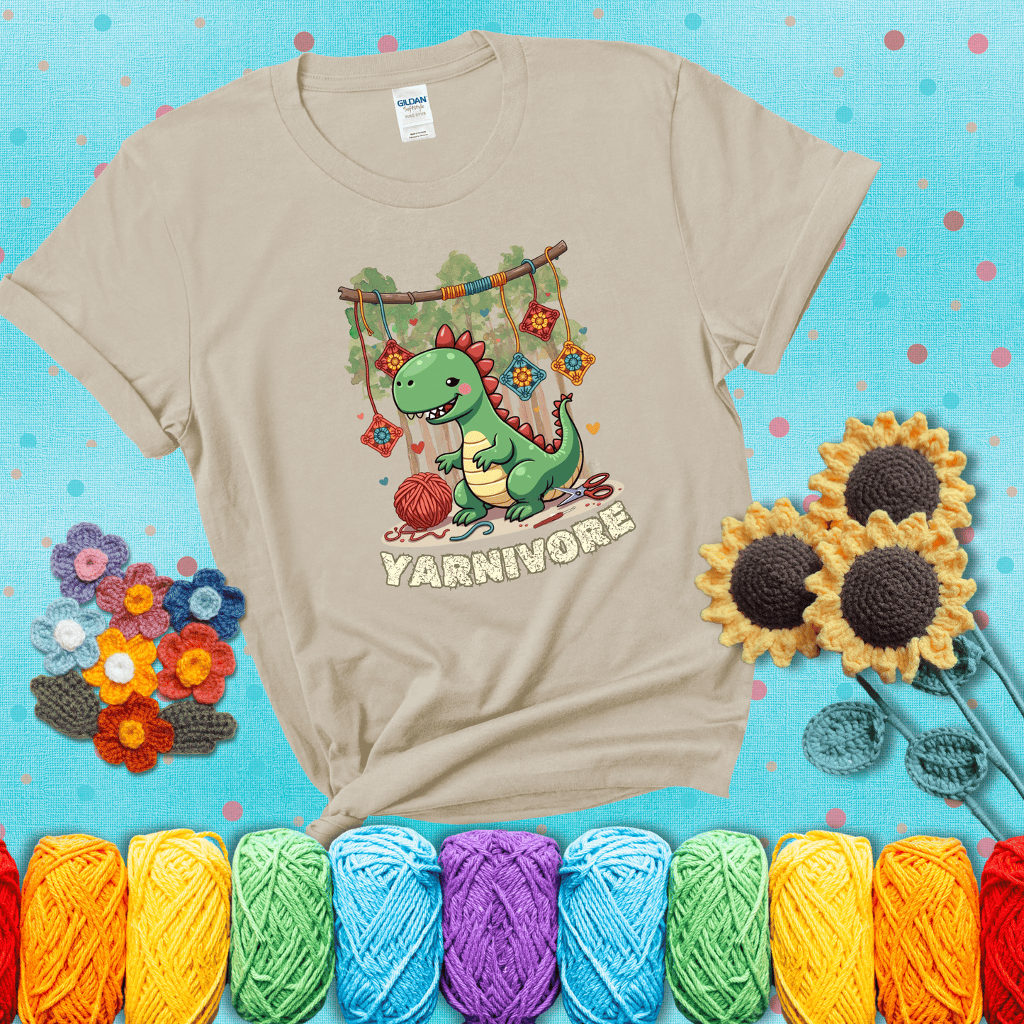 Silly dinosaur chomping on yarn skeins. Text reads: “Yarnivore.” A fun and quirky tee for yarn-obsessed crafters with big appetites, showing a beige tee with a teal sunflower background