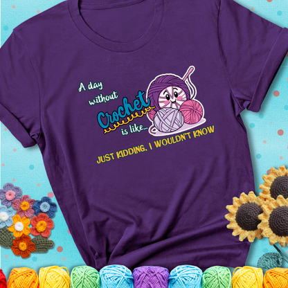 Purple t-shirt showing a smiling yarn ball character with text “A day without crochet is like... just kidding, I wouldn’t know”; funny crochet t-shirt.