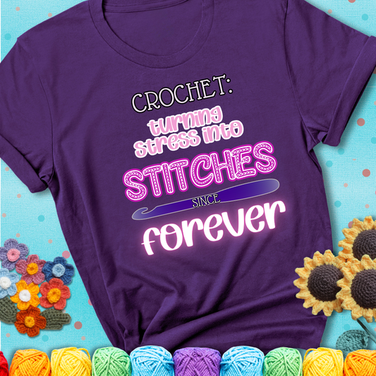 When life gets tangled, we stitch it out Design reads 'Crochet: Turning Stress Into Stitches Since Forever' , perfect crochet gift for yarn lovers; showing a purple tee with a teal sunflower background