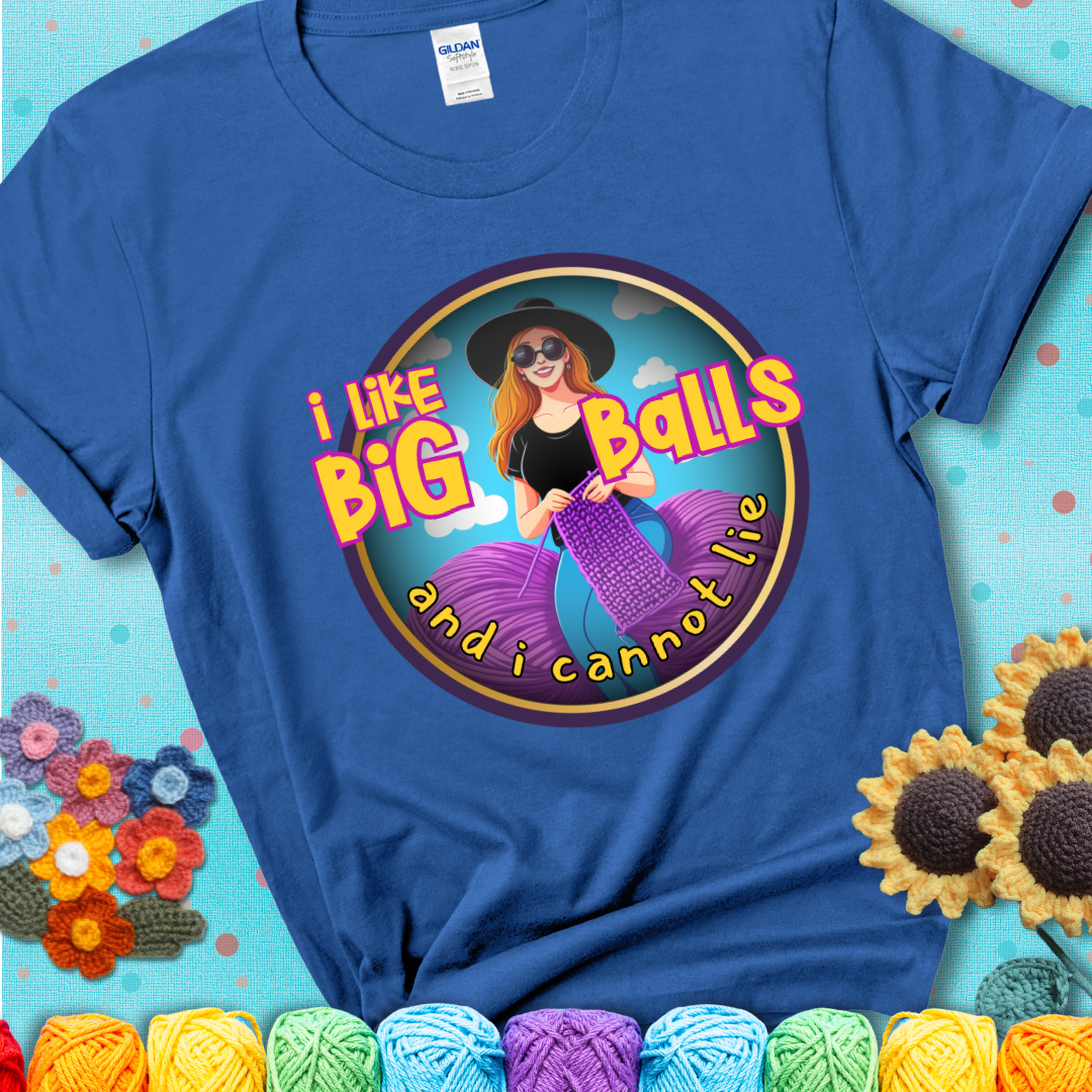 Bold cartoon image of a woman crocheting between two giant purple yarn balls with the phrase “I like big balls and I cannot lie” in retro fonts showing a royal blue tee with a teal sunflower background