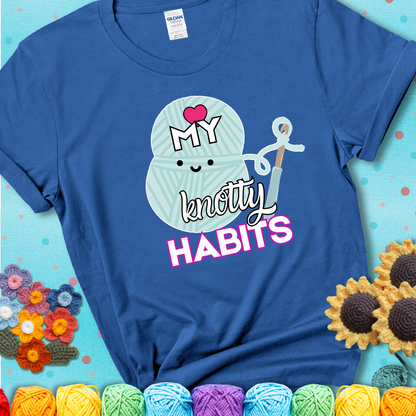 Smiling yarn ball and hook with text “Love My Knotty Habits” - cute crochet shirt with playful design for makers, showing a blue tee with a teal sunflower background