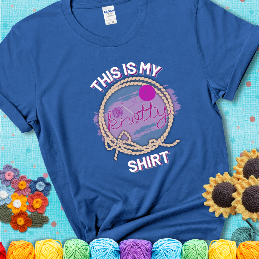 Royal Blue t-shirt with the phrase “This is My Knotty Shirt” inside a rope circle, featuring a yarn ball and crochet hook forming the word “knotty.”
