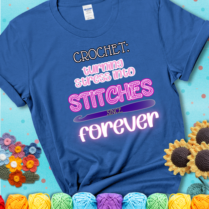 When life gets tangled, we stitch it out Design reads 'Crochet: Turning Stress Into Stitches Since Forever' , perfect crochet gift for yarn lovers; showing a blue tee with a teal sunflower background