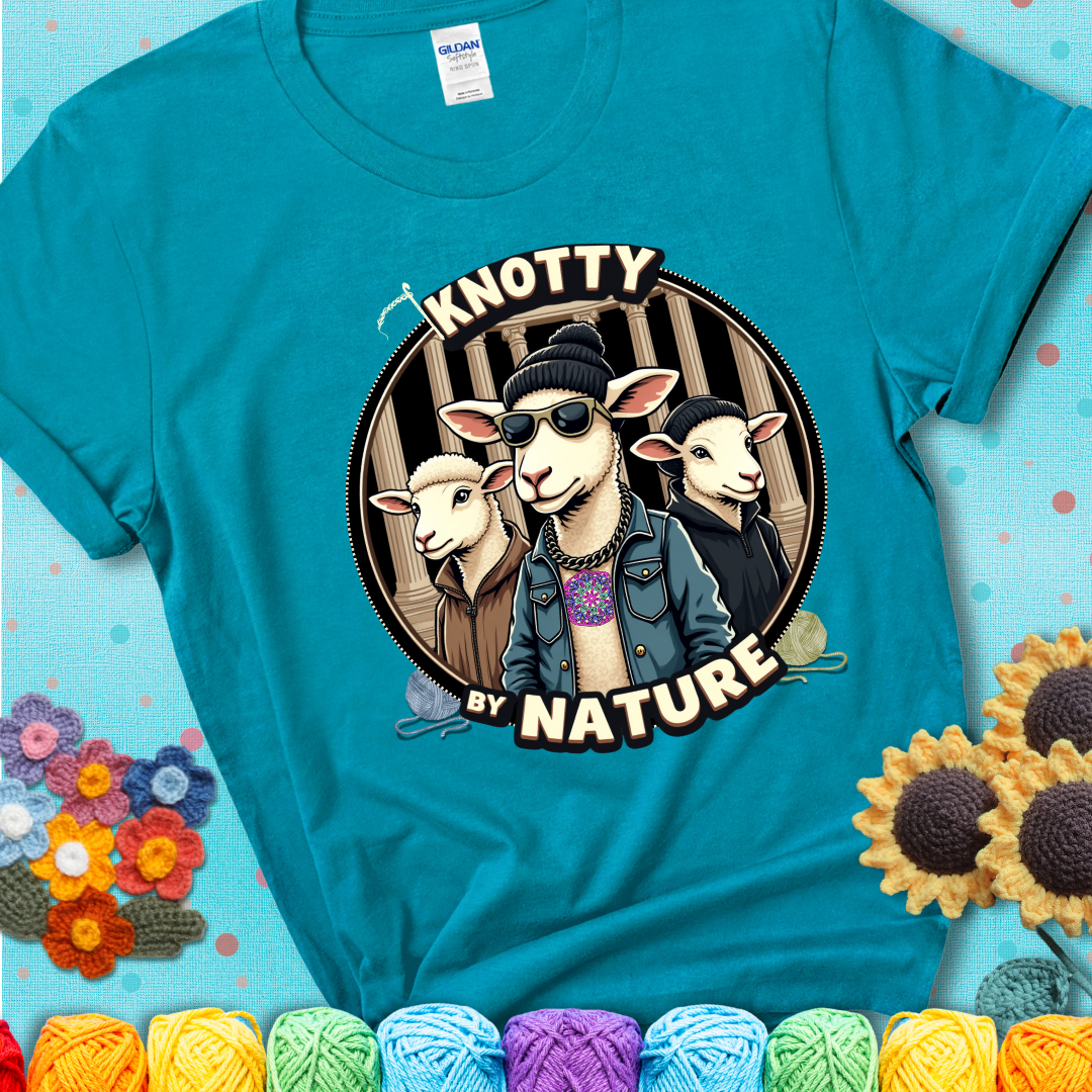 Three cool sheep dressed in urban streetwear pose in front of columns, with bold text “Knotty By Nature” on a blue-green teal tee, a hilarious crochet parody with swagger.