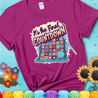 Antique Heliconia t-shirt with a colorful crochet blanket in progress, blue yarn ball, crochet hook, and the phrase “It’s The Final Countdown.”
