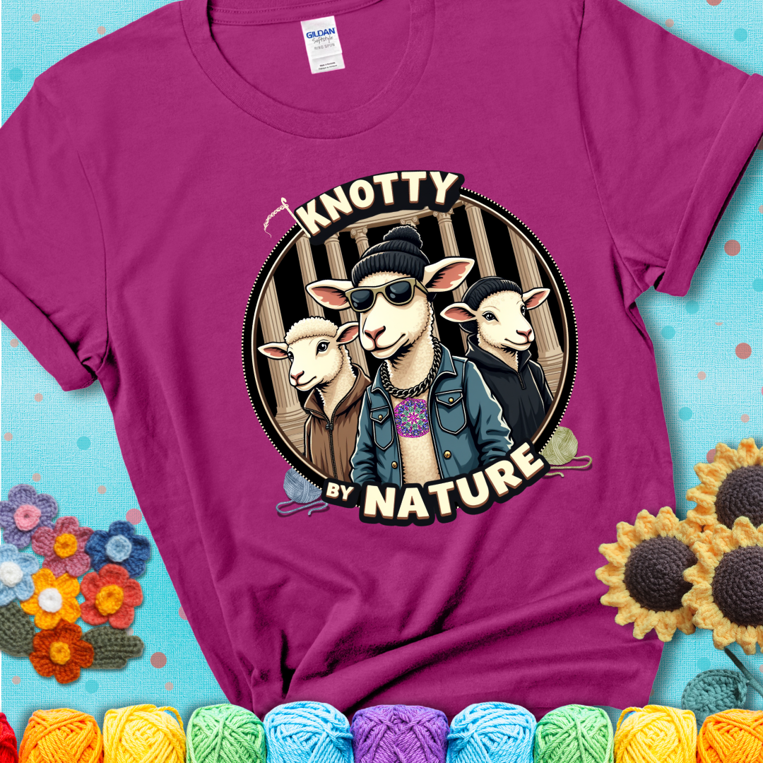 Three cool sheep dressed in urban streetwear pose in front of columns, with bold text “Knotty By Nature” on a magenta tee, a hilarious crochet parody with swagger.