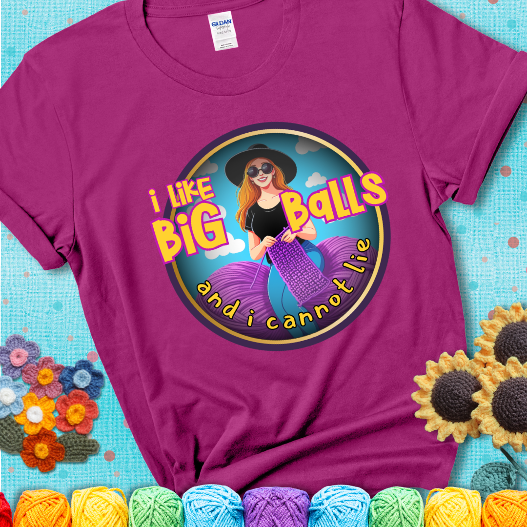 Bold cartoon image of a woman crocheting between two giant purple yarn balls with the phrase “I like big balls and I cannot lie” in retro fonts showing a magenta tee with a teal sunflower background