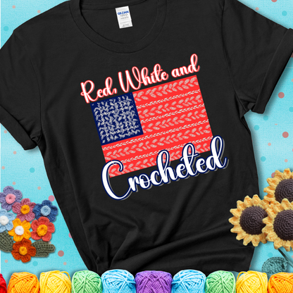 Black t-shirt showing a patriotic crochet-themed American flag design with red and white yarn stitches forming the stripes and blue and white stitches as stars.