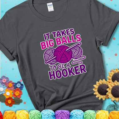 Say it with stitches Design reads 'Crochet Is My Love Language', perfect crochet gift for yarn lovers; showing a charcoal grey tee with a teal sunflower background
