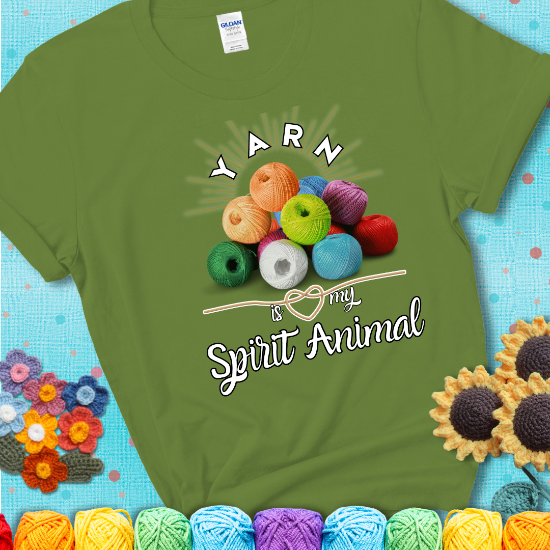 Stack of colorful yarn balls with radiant glow. Text reads: “Yarn Is My Spirit Animal.” A calming and colorful tee for fiber lovers who find zen in stitching, showing a green  tee with a teal sunflower background