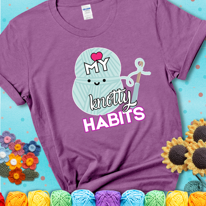 Smiling yarn ball and hook with text “Love My Knotty Habits” - cute crochet shirt with playful design for makers, showing a lavender tee with a teal sunflower background