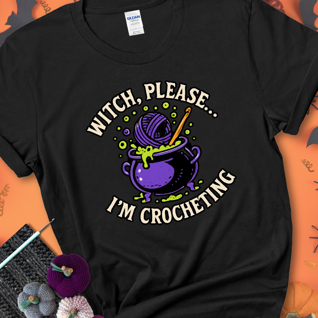 Black “Witch, Please… I’m Crocheting” Halloween crochet shirt with purple cauldron, yarn, and crochet hook