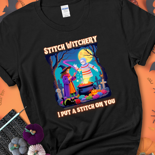 Black t-shirt with a yarn witch casting a spell from a cauldron onto a floating crochet ghost, with text “Stitch Witchery” and “I Put a Stitch on You.”