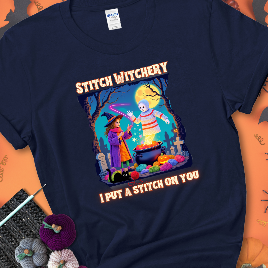 Navy t-shirt with a yarn witch casting a spell from a cauldron onto a floating crochet ghost, with text “Stitch Witchery” and “I Put a Stitch on You.”