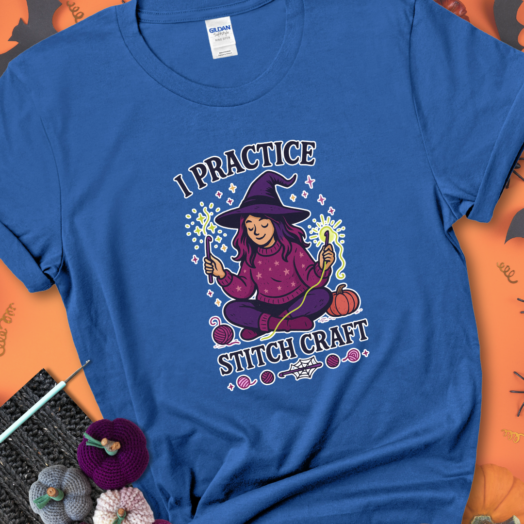 Royal t-shirt with a witchy crocheter conjuring glowing yarn with crochet hooks, surrounded by stars and pumpkins, with the phrase “I Practice Stitch Craft.”