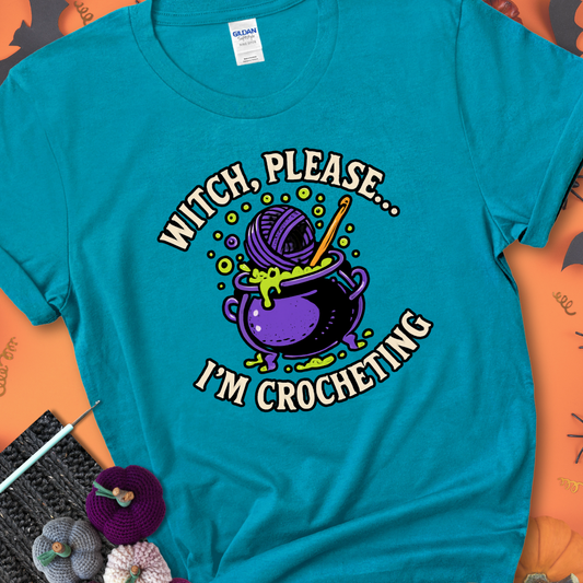 Tropical blue “Witch, Please… I’m Crocheting” Halloween crochet shirt with purple cauldron, yarn, and crochet hook