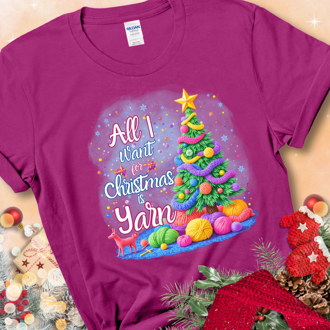 Antique Heliconia t-shirt with a colorful Christmas tree decorated with yarn and the phrase “All I Want For Christmas Is Yarn.”