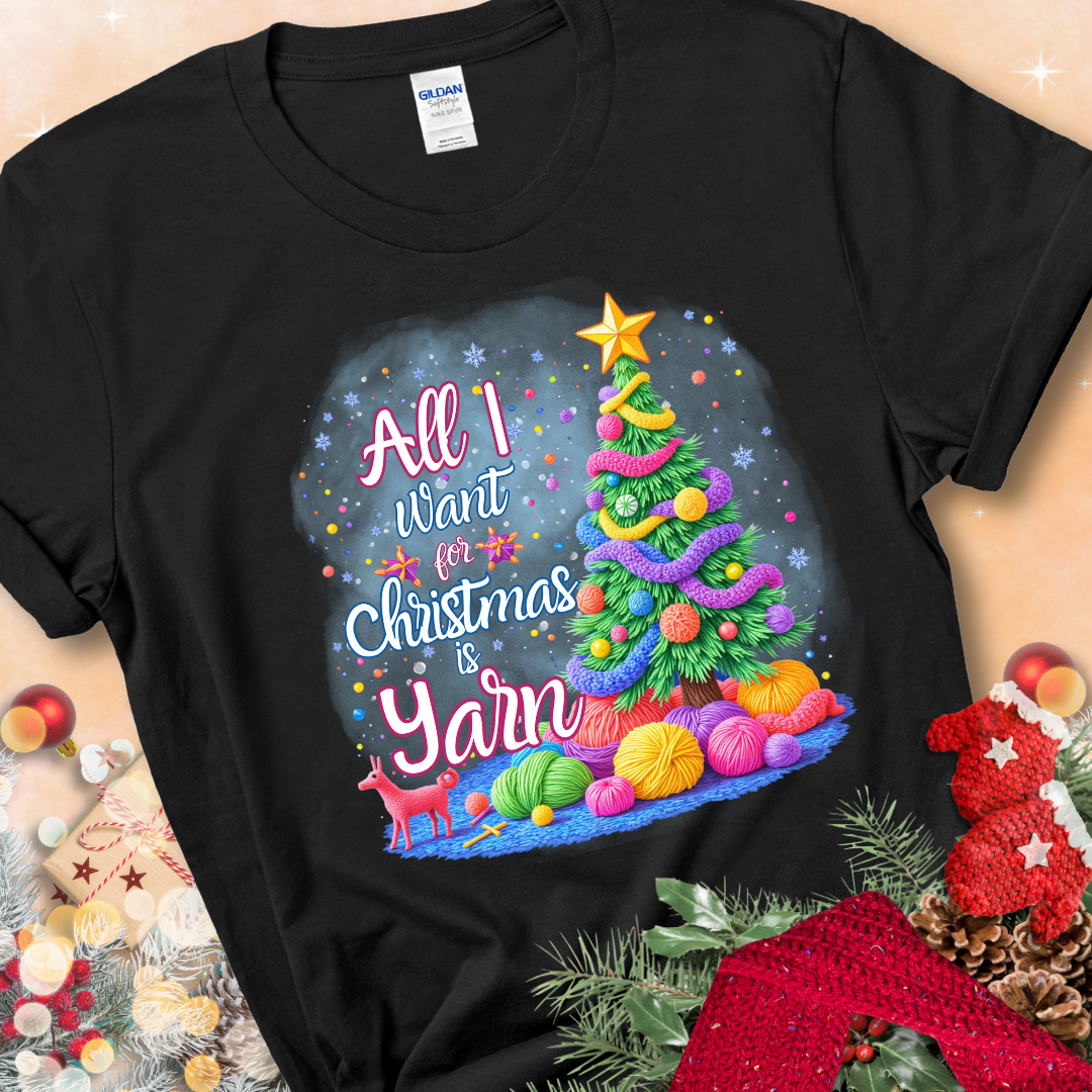 Black t-shirt with a colorful Christmas tree decorated with yarn and the phrase “All I Want For Christmas Is Yarn.”