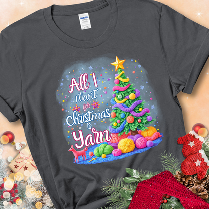 Charcoal t-shirt with a colorful Christmas tree decorated with yarn and the phrase “All I Want For Christmas Is Yarn.”