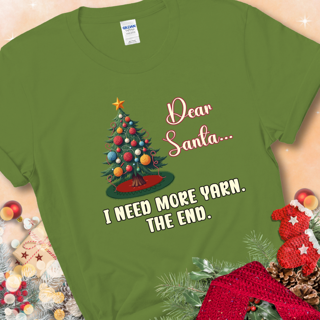Kiwi t-shirt with a Christmas tree decorated with yarn-ball ornaments and the stitched message “Dear Santa… I Need More Yarn. The End.”