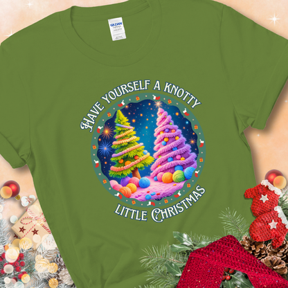 Kiwi t-shirt with two yarn-covered Christmas trees wrapped in colorful strands of yarn, encircled by the phrase “Have Yourself A Knotty Little Christmas.”