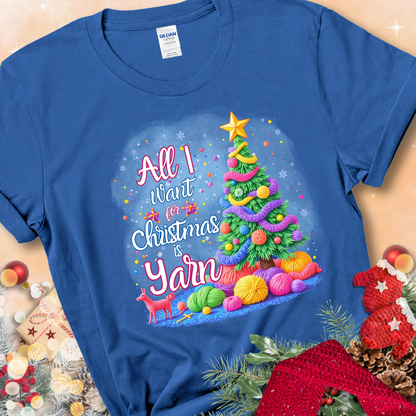 Royal Blue t-shirt with a colorful Christmas tree decorated with yarn and the phrase “All I Want For Christmas Is Yarn.”