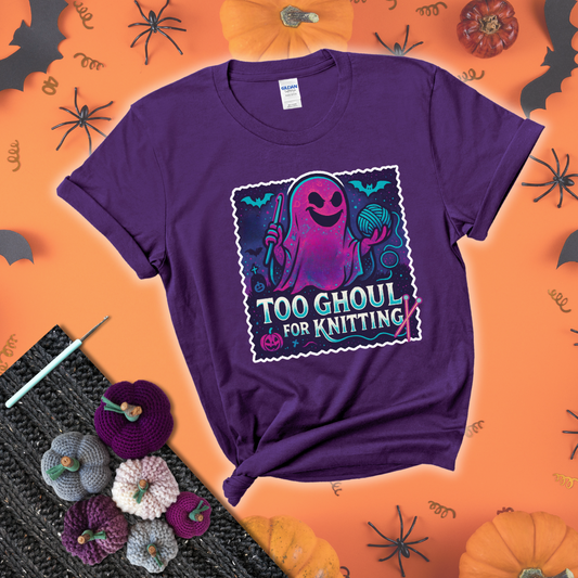 A spooky ghost holds a yarn ball and crochet hook in a vibrant Halloween palette with bats, tombstones, and pumpkins wearing a purple tee with a festive halloween background