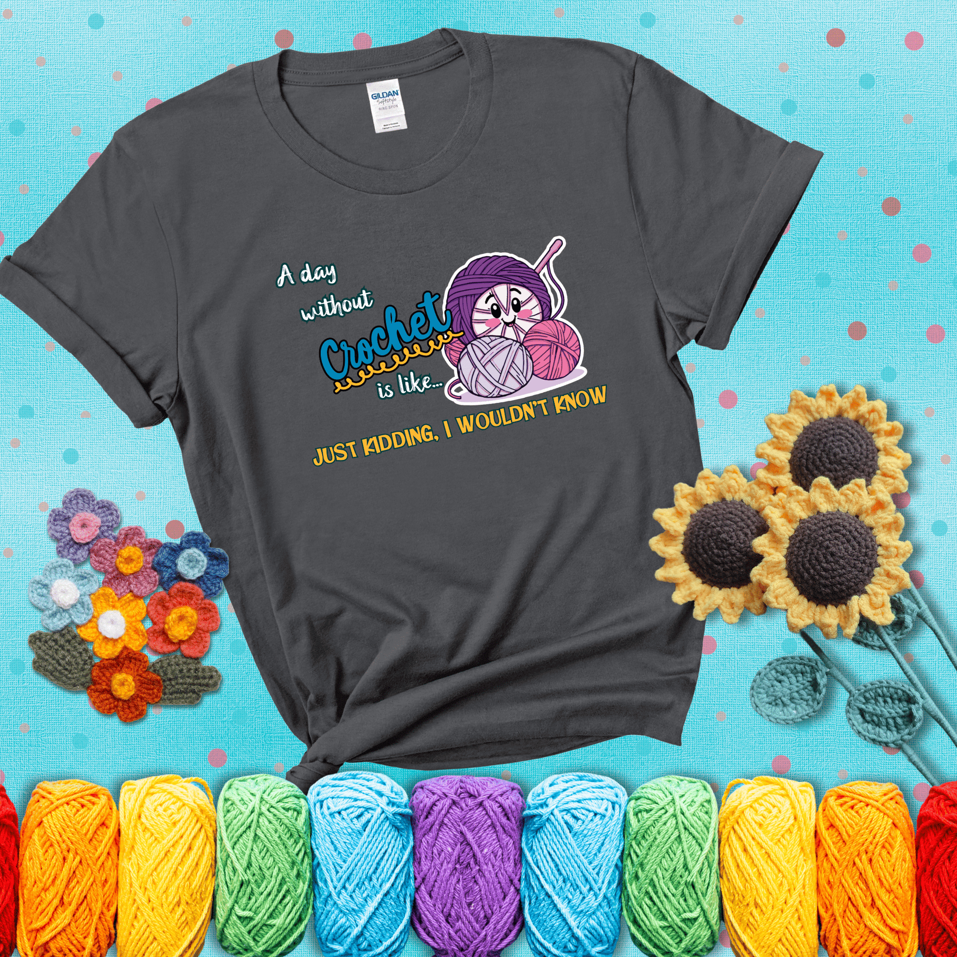 Cartoon ball of yarn character with happy face surrounded by more yarn and a hook, next to playful text about never skipping crochet, wearing a dark grey tee with a teal sunflower background