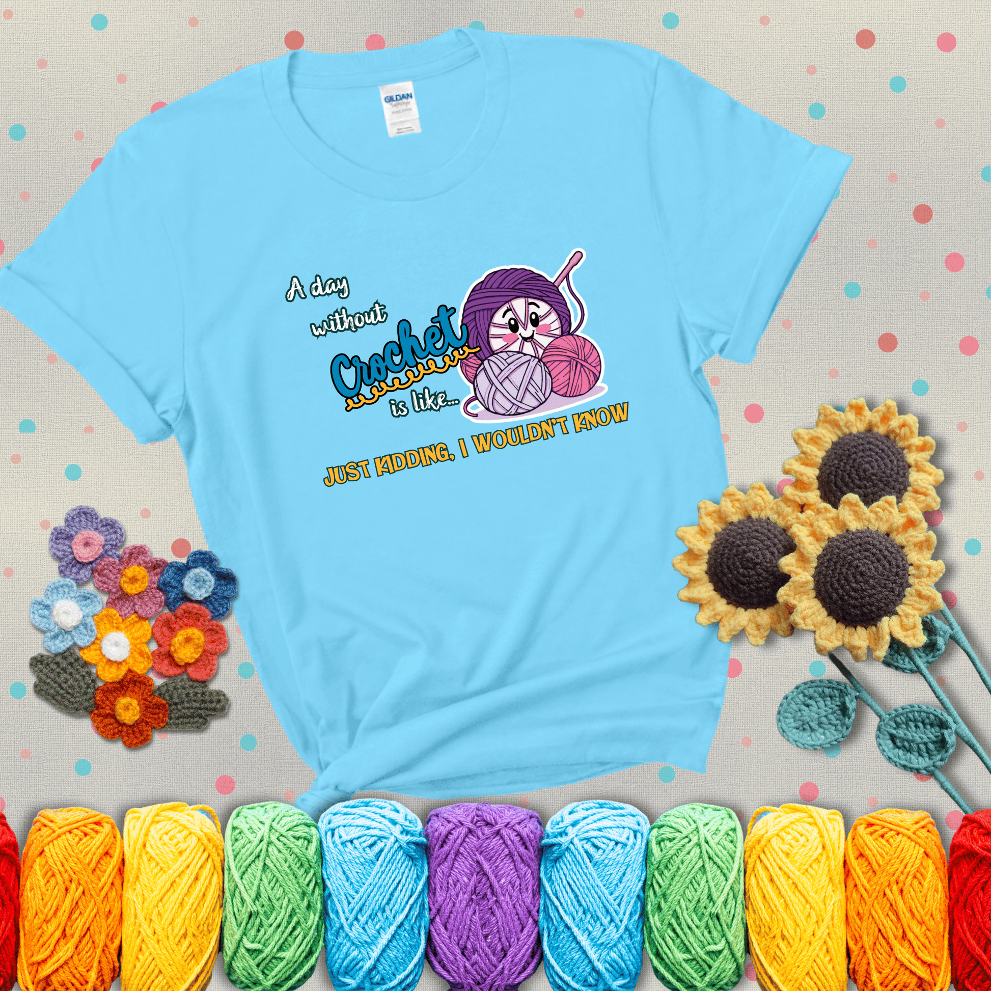 Cartoon ball of yarn character with happy face surrounded by more yarn and a hook, next to playful text about never skipping crochet, wearing a light blue tee with grey sunflower background