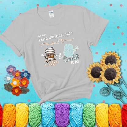 Design reads “My body: I need water and food. Me: Coffee & Crochet it is,” with a smiling coffee cup and yarn ball characters showing a light grey tee with a teal sunflower background