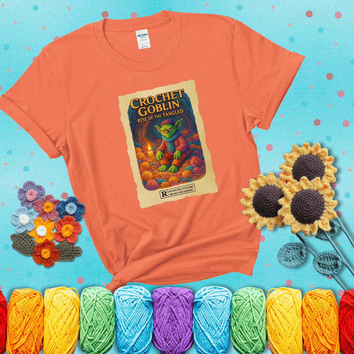 Crochet goblin surrounded by chaotic yarn stash in a cave-like lair. Text reads: “Crochet Goblin: Rise of the Tangled.” A funny fantasy-style tee for yarn hoarders and goblin-mode crafters. showing a light orange tee with a teal sunflower background