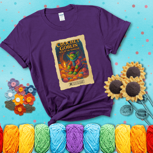 Crochet goblin surrounded by chaotic yarn stash in a cave-like lair. Text reads: “Crochet Goblin: Rise of the Tangled.” A funny fantasy-style tee for yarn hoarders and goblin-mode crafters. showing a purple tee with a teal sunflower background