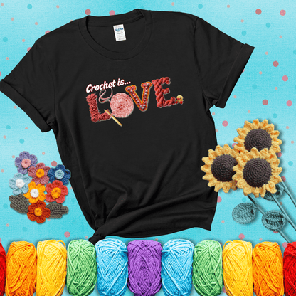 The word "LOVE" spelled with different crochet textures and yarn in red tones, with the phrase “Crochet is…” above in script. showing a magenta tee with a teal sunflower background