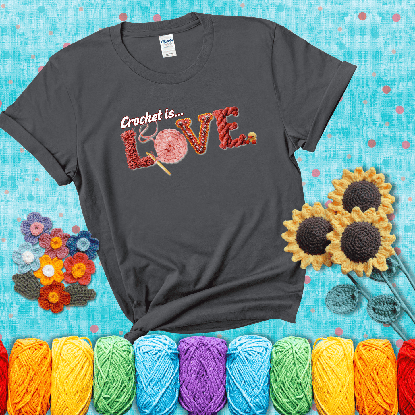 The word "LOVE" spelled with different crochet textures and yarn in red tones, with the phrase “Crochet is…” above in script. showing a pink tee with a teal sunflower background