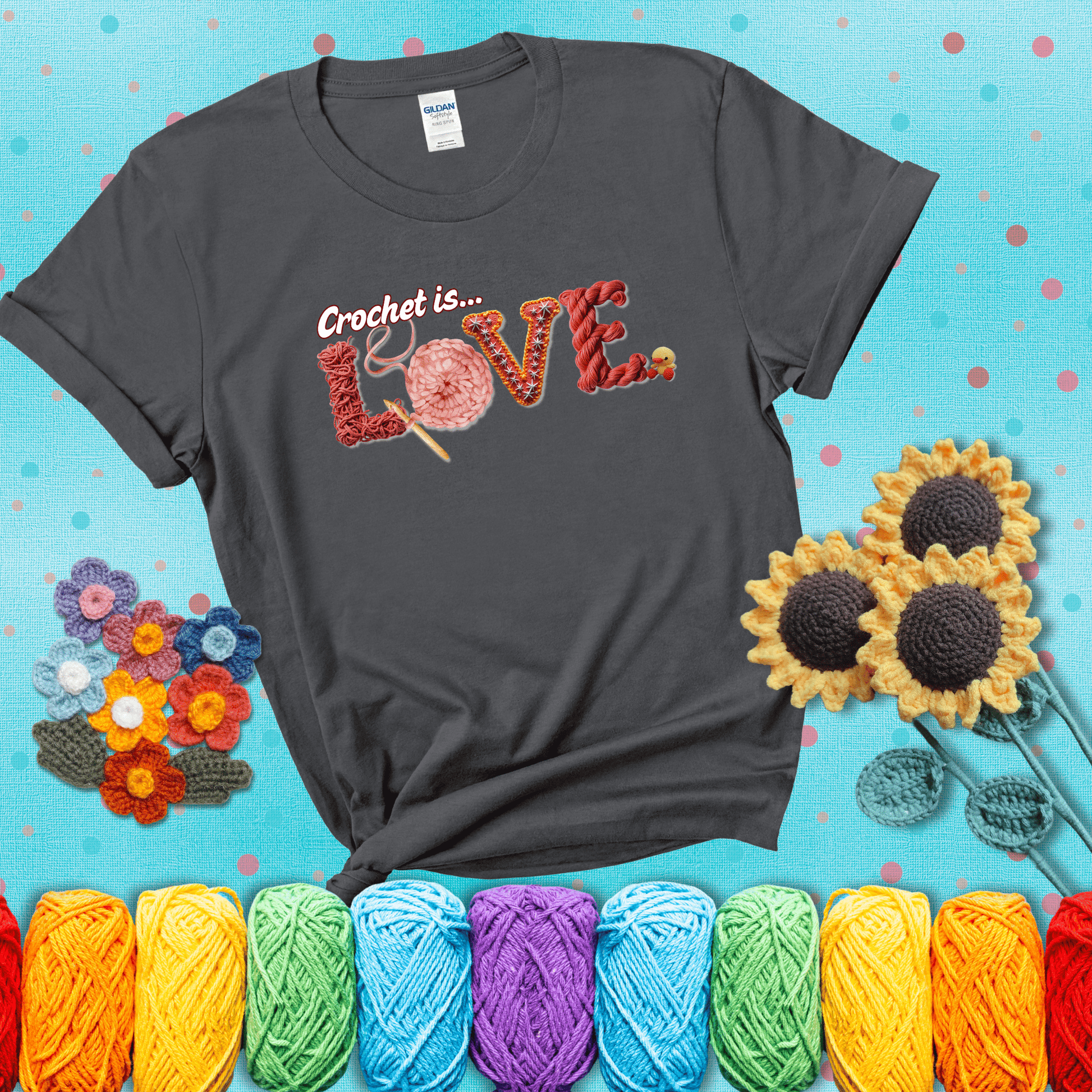 The word "LOVE" spelled with different crochet textures and yarn in red tones, with the phrase “Crochet is…” above in script. showing a pink tee with a teal sunflower background