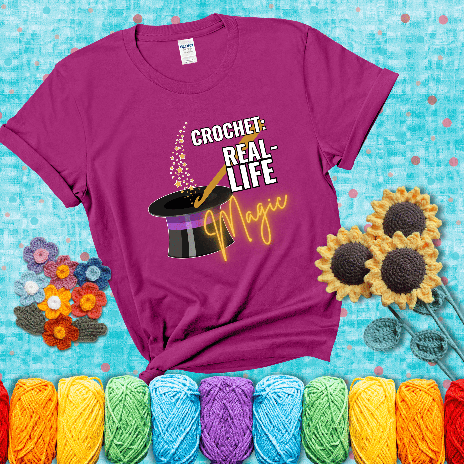 Poof! Stress gone Design reads 'Crochet: Real-Life Magic' , perfect crochet gift for yarn lovers; showing a magenta tee with a teal sunflower background