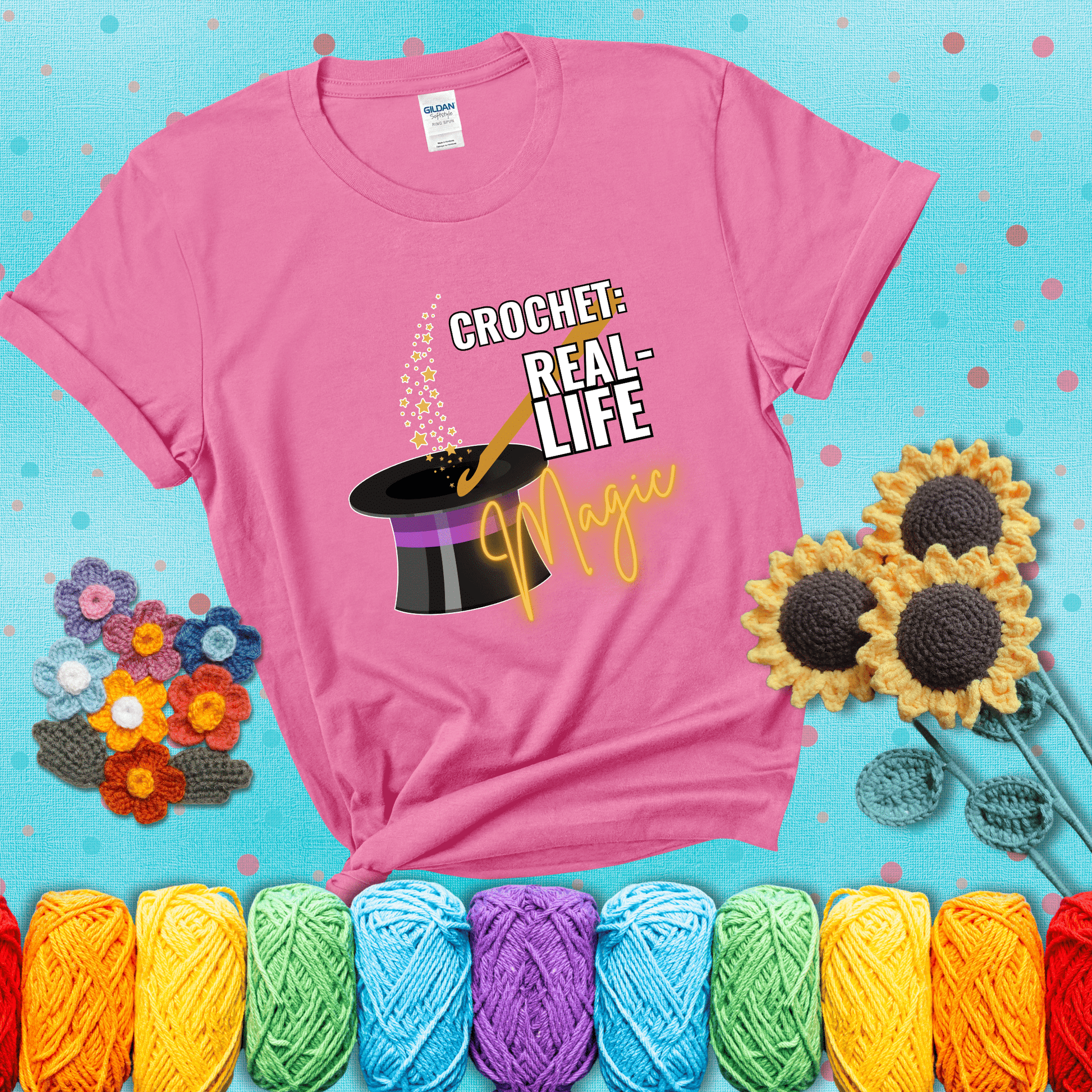 Poof! Stress gone Design reads 'Crochet: Real-Life Magic' , perfect crochet gift for yarn lovers; showing a pink tee with a teal sunflower background